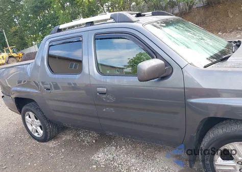 2011 Honda Ridgeline Rtl z USA, uszkodzony, nr VIN 5FPYK1F55BB005874